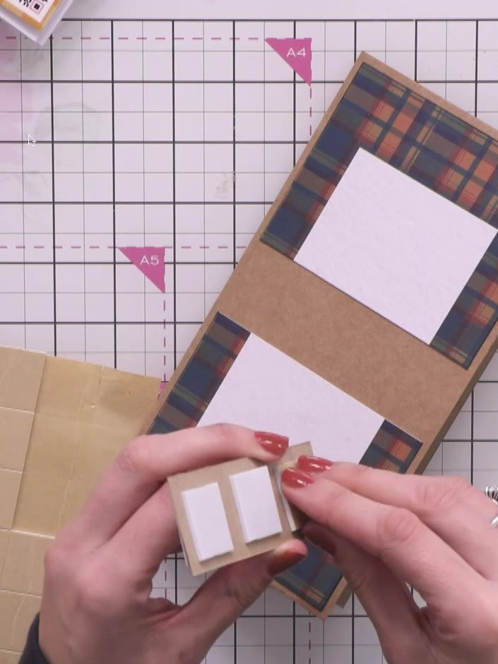 Step 8: Arrange the fussy-cut floral elements in a cascading pattern down the centre of your card front, using foam pa