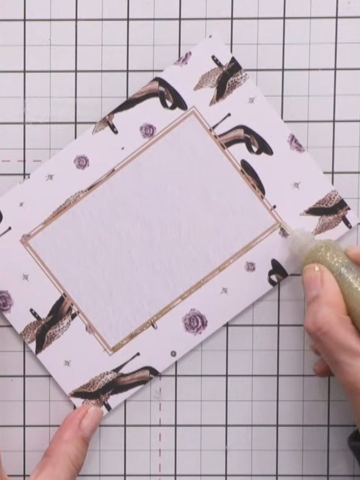 Step 2: Apply glitter glue around the edges of the gold frame to add sparkle and dimension. Use a bottle with a fine a