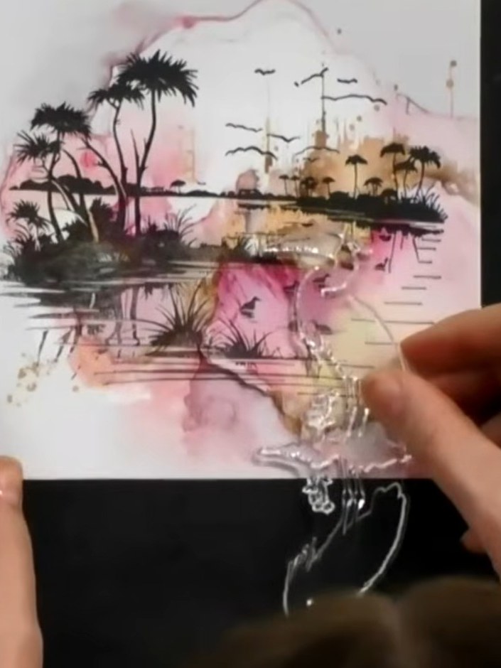 Step 5: Stamp the bird image again in the same position using darker ink to create more depth and make the bird stand 