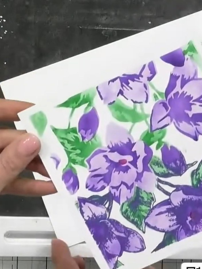 Step 7: Use the coordinating die to cut out the stamped floral design. The die should fit neatly into the white space 