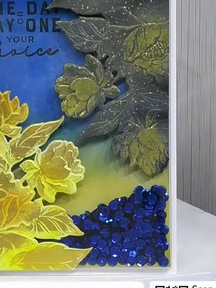 Step 2: Run your embossing folder and die through your die-cutting machine to emboss the design and cut the window ape