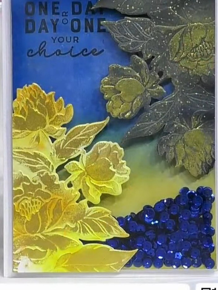 Step 5: Adhere an acetate sheet from the kit to the back of the embossed card front using a tape runner. This will cre