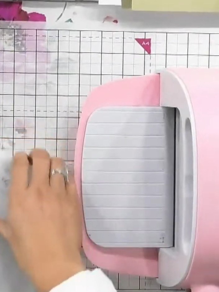 Step 4: If desired, trim the embossed piece to your preferred card size using your cutting machine or trimmer. Adjust 
