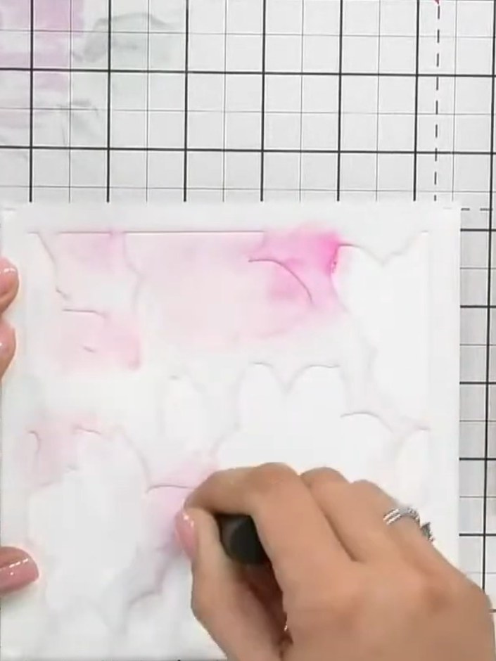 Step 6: Position the first half of the split stamp set onto the card and stamp the stem detail using black ink. Hold t