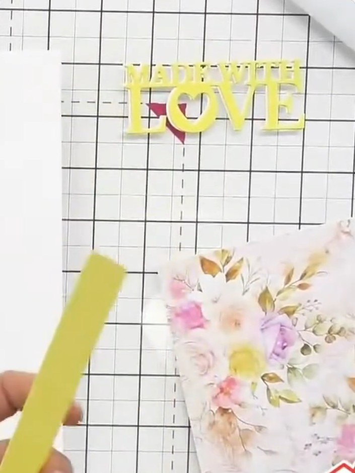Step 3: Select a decorative paper topper or sentiment piece to position behind the window aperture. Place the white di