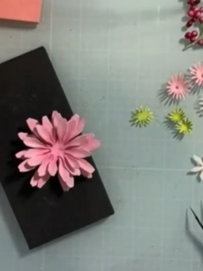 Step 6: Cut three centre pieces from the Gerbera Daisy die set. Colour them with a lighter pink shade using your colou