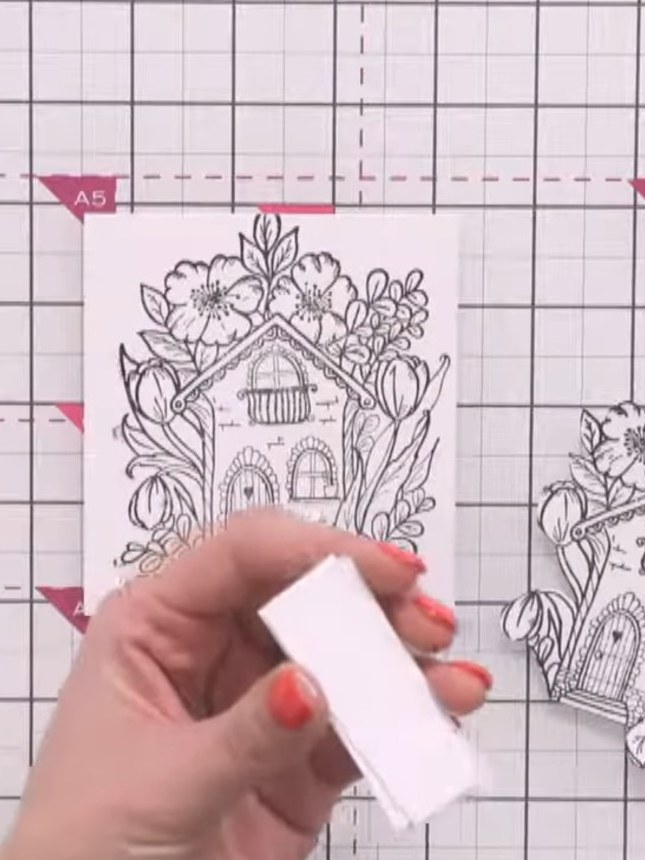 Step 3: Collect small offcuts of white card and layer them together with adhesive to create a homemade foam pad for ad
