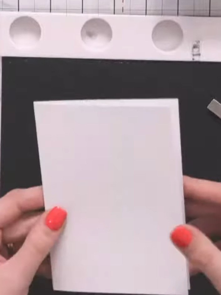 Step 1: Take a small card blank and position it in your stamping area so the hinge of the card sits at the edge of the