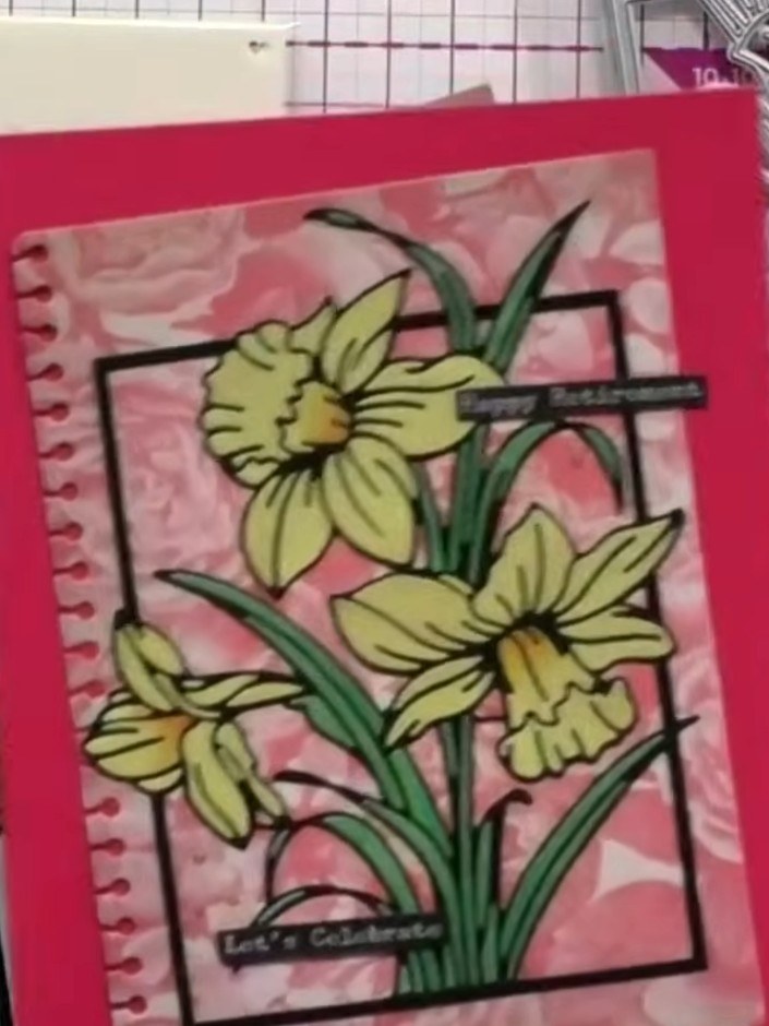 Step 5: Mount the coloured daffodil panel onto a pink background card with a coordinating patterned paper insert. Posi