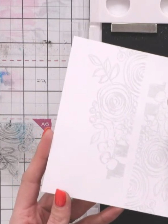 Step 4: Heat set the embossing powder using a heat tool, moving it over the design until the powder melts and becomes 