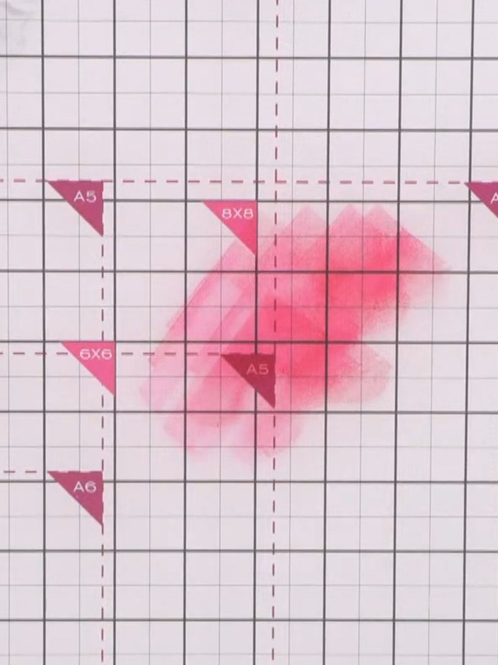 Step 5: Create a wet puddle of pink watercolour on your craft mat. Spray the puddle with water to keep it wet and work