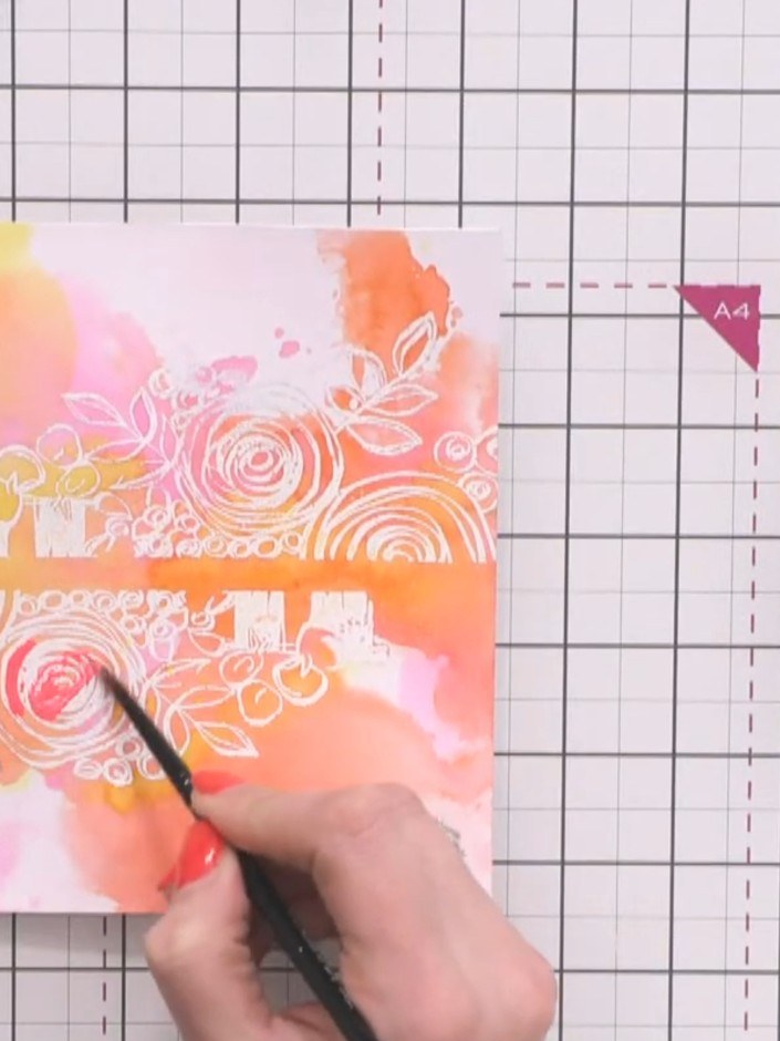 Step 9: Use the heat tool to dry the watercoloured cards completely. Gently wipe away any excess water with tissue to 
