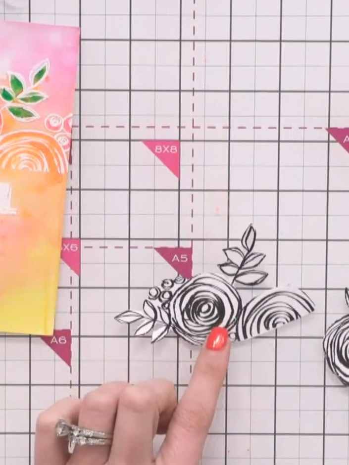 Step 1: Cut out the floral elements that have been stamped in black ink. Separate the individual flower motifs from th