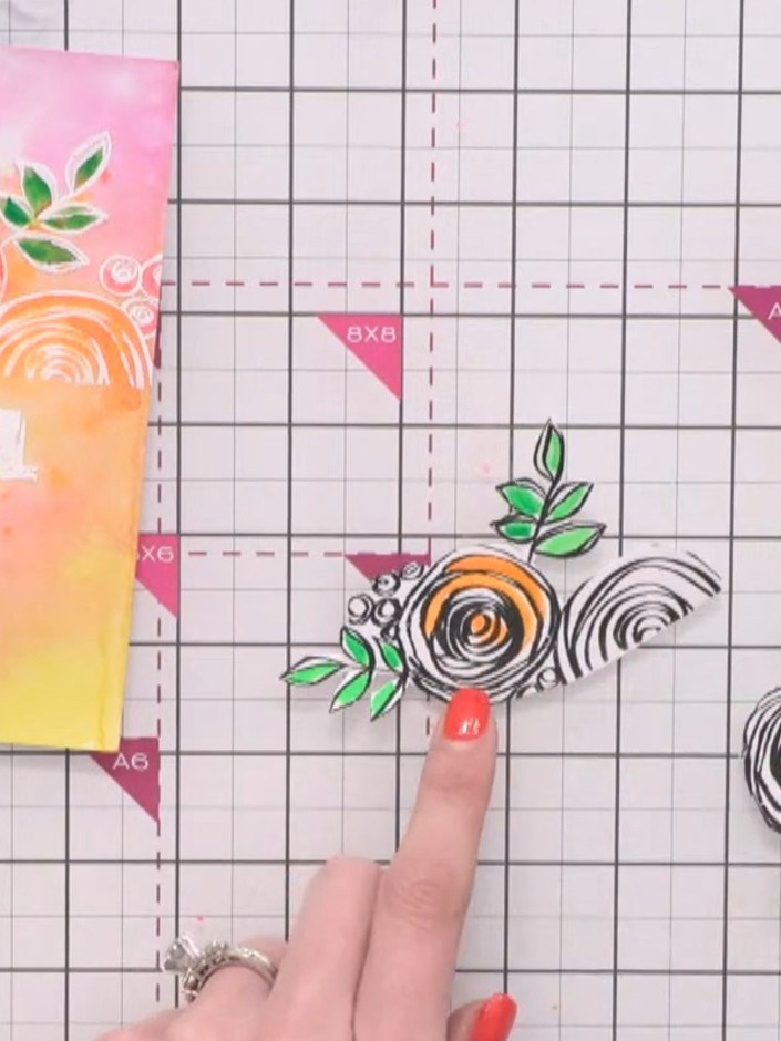Step 2: Spray your neon watercolour paints with water to activate them. This will prepare the paints for use on your s