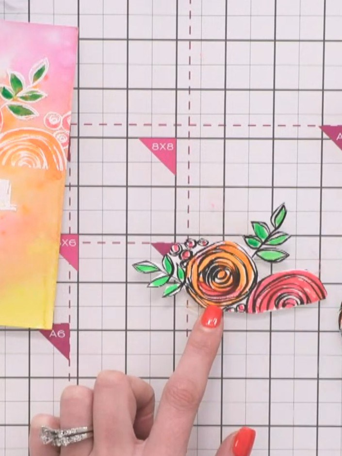 Step 6: Allow the painted floral die-cut pieces to dry completely before using them on your card project. The vibrant 