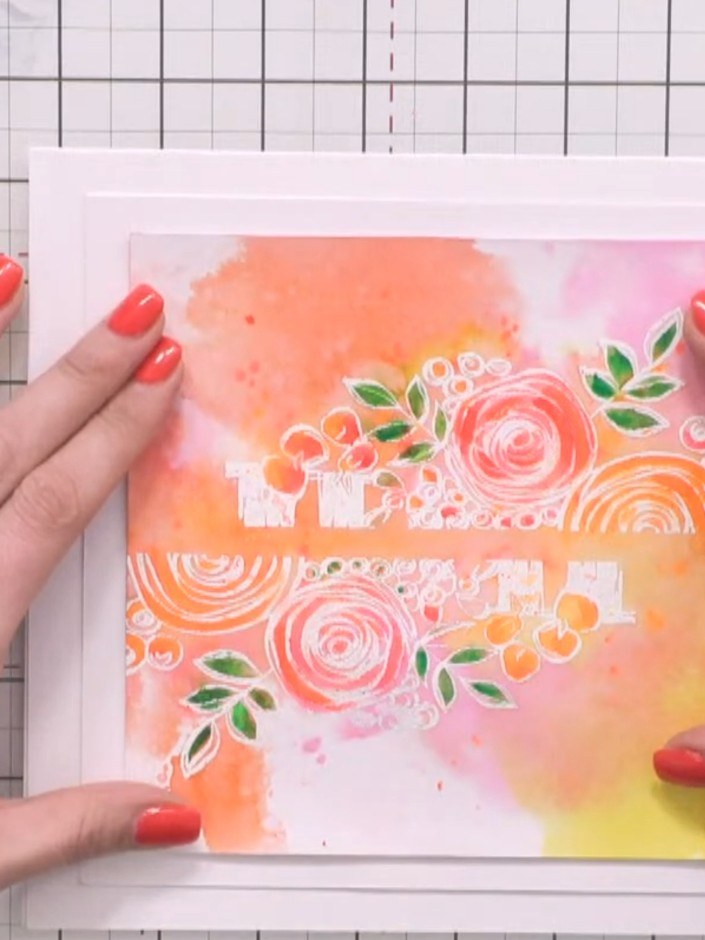 Step 3: Apply adhesive to the back of your watercoloured embossed panel and position it centrally on top of the white 