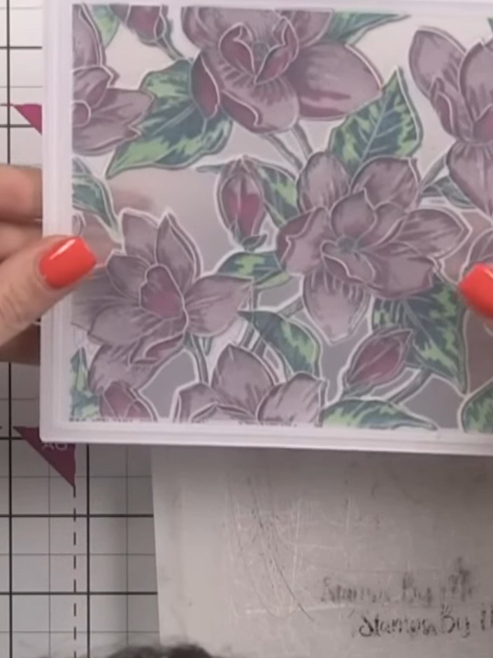 Step 10: Run the die-cut floral piece through the 3D embossing folder to create dimensional texture with chamfered edge