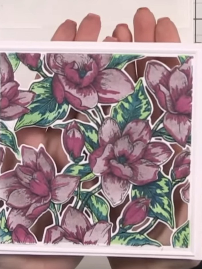 Step 11: Trim away any excess card around the edges of your layered floral design. Your finished vintage-style 3D embel