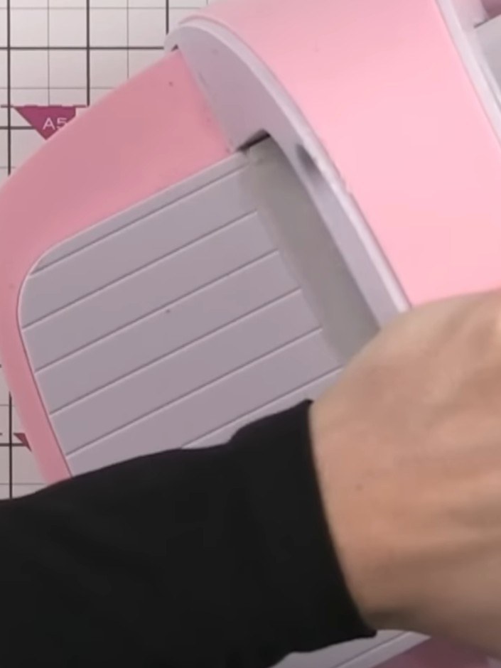 Step 3: Run the pink cardstock through your die-cutting machine using your standard plate settings with the embossing 