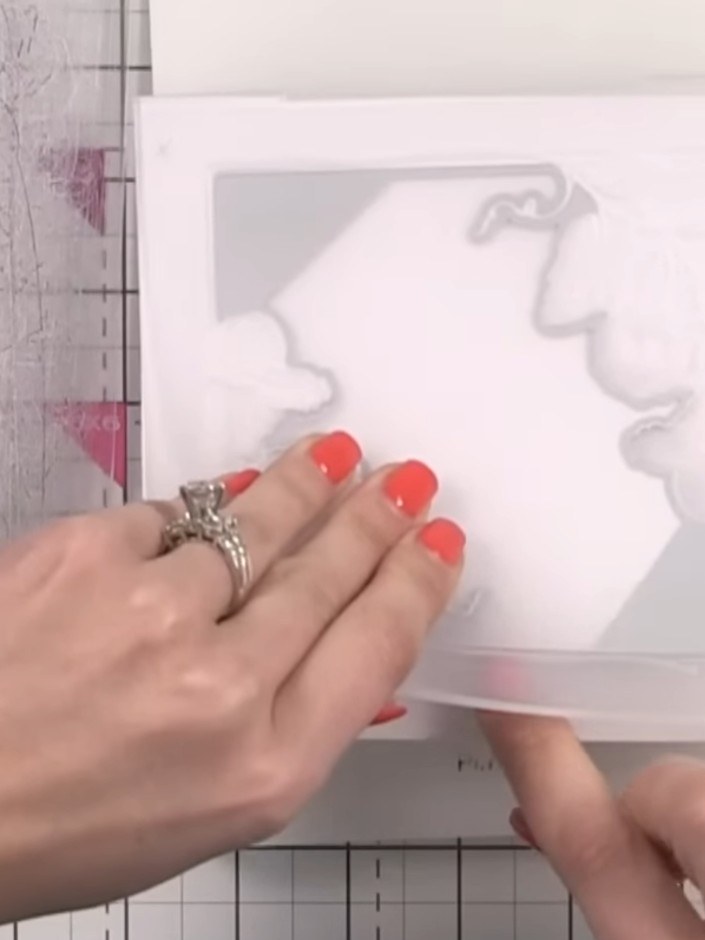 Step 4: Carefully remove the cardstock from the embossing folder to reveal the embossed design with the chamfered fram