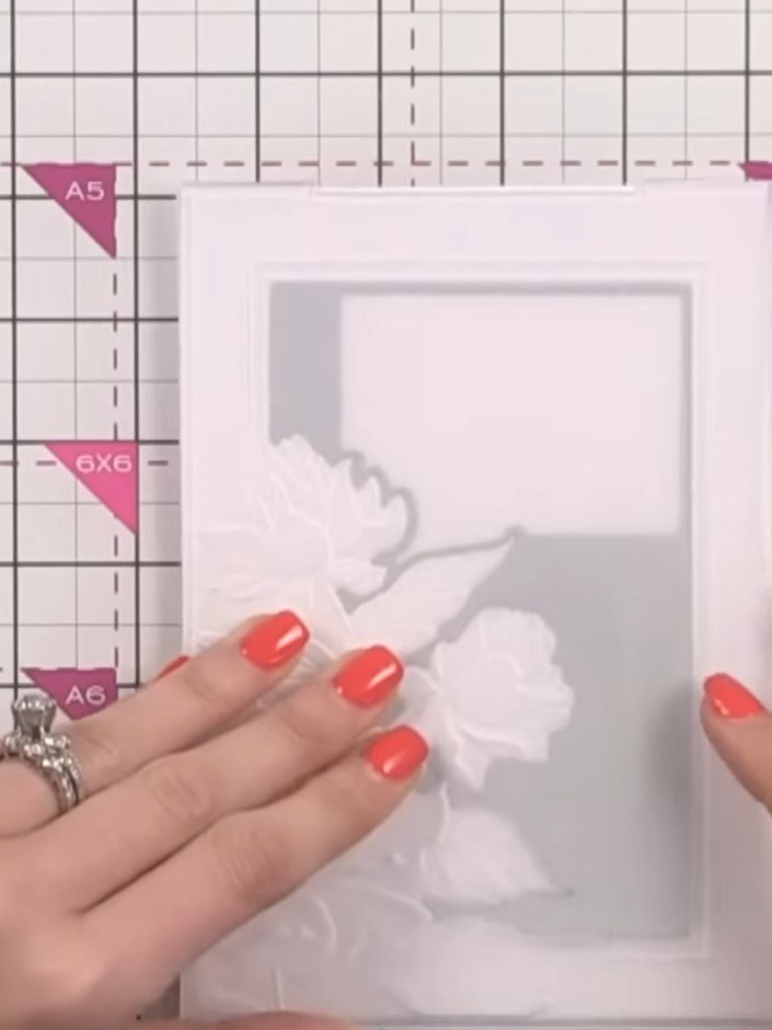 Step 4: Remove the cardstock from the embossing folder to reveal the embossed design featuring double chamfered edges 