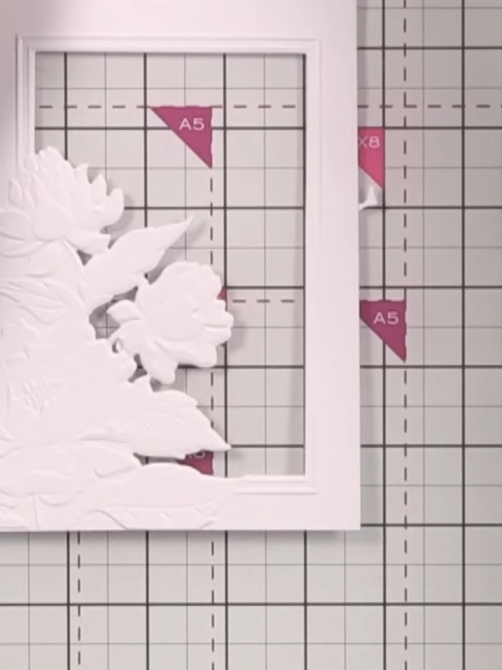Step 5: Display the finished card to show the beautiful 3D effect created by the embossing folder. The white embossed 