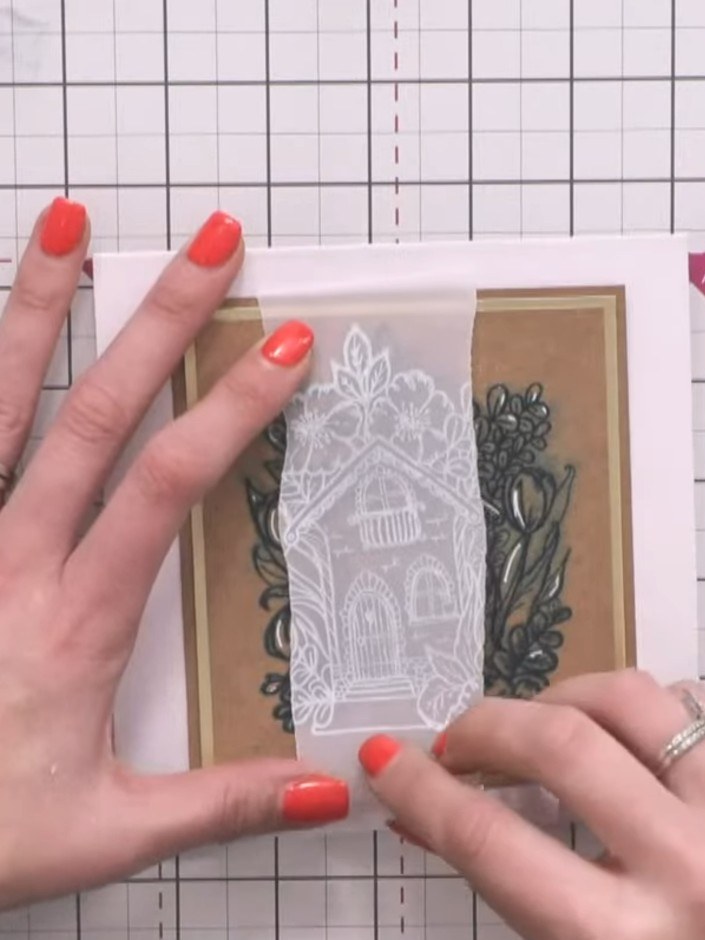 Step 11: Trim the vellum overlay to size so it fits within your card layers. Tuck the vellum under the layered card pie