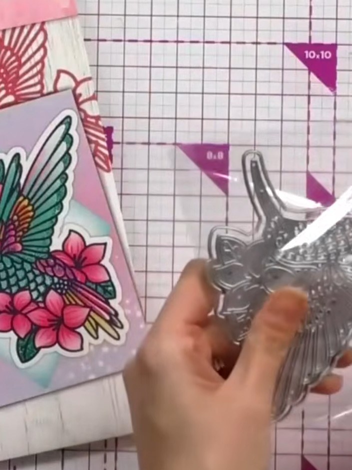 Step 4: Use the detailed bird die from the stencil and die set to cut out the coloured bird image. Carefully remove th