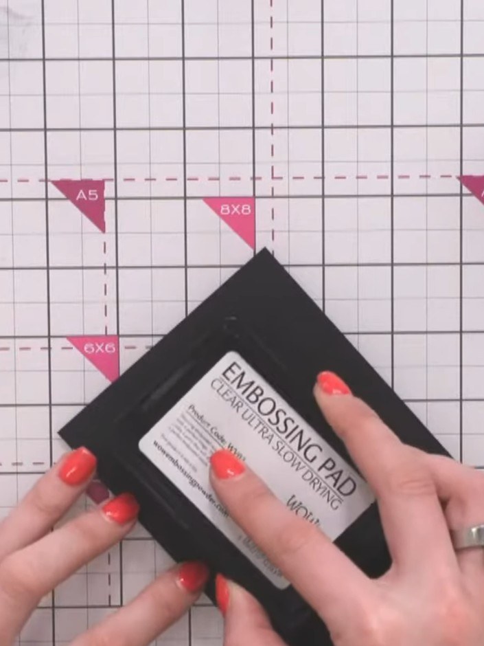 Step 5: Once the embossing powder has cooled completely, apply sticky embossing ink over the embossed design again, en