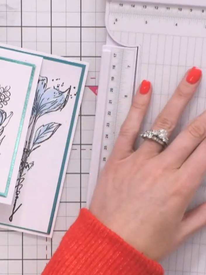 Step 10: Cut a belly band from A4 card, approximately 1.5 inches (4 cm) wide. Use a scoring tool and ruler to score the