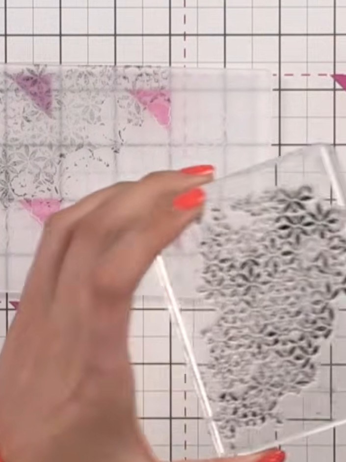 Step 4: Carefully remove the cardstock from the embossing folder to reveal the transferred patterned print on the rais