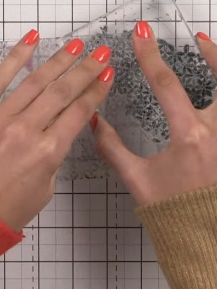 Step 5: Optional: Add colour to the raised embossed areas using watercolour brushes and ink pads in complementary shad