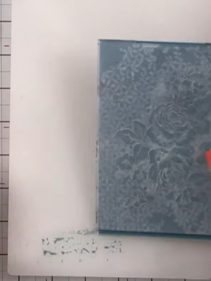 Step 5: If desired, layer additional ink colours over the embossed design to create deeper, more complex effects. Gent