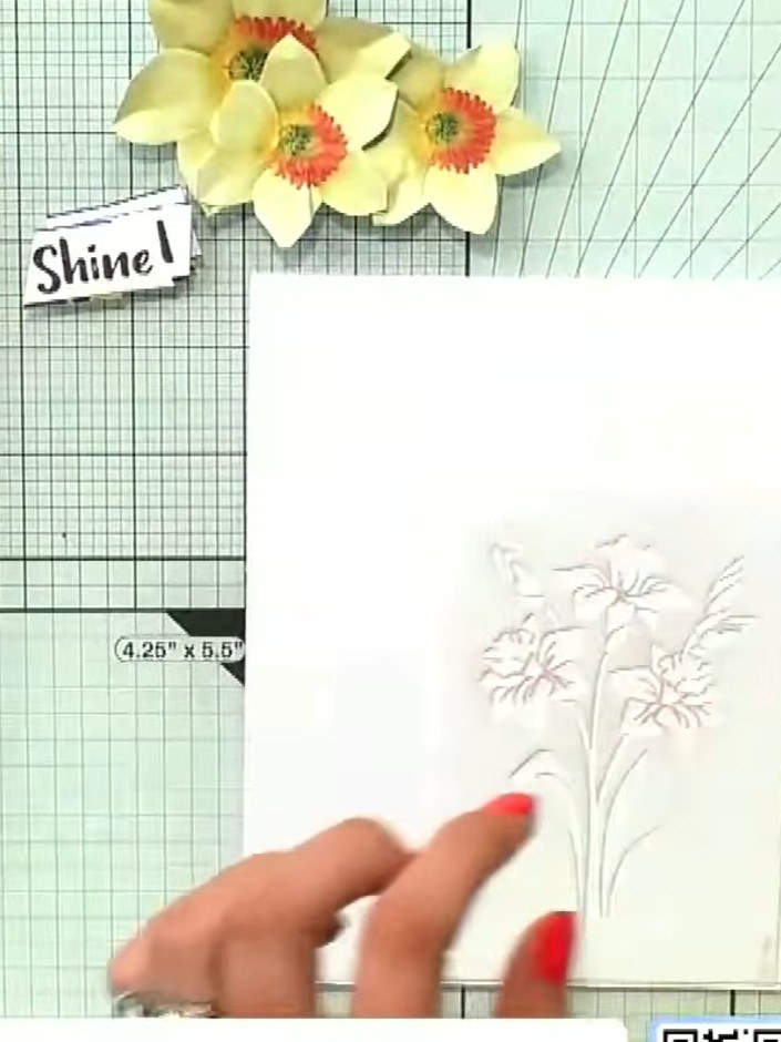 Step 1: Position the mini daffodil stencil onto white cardstock on your craft mat. Ensure the stencil is flat and secu