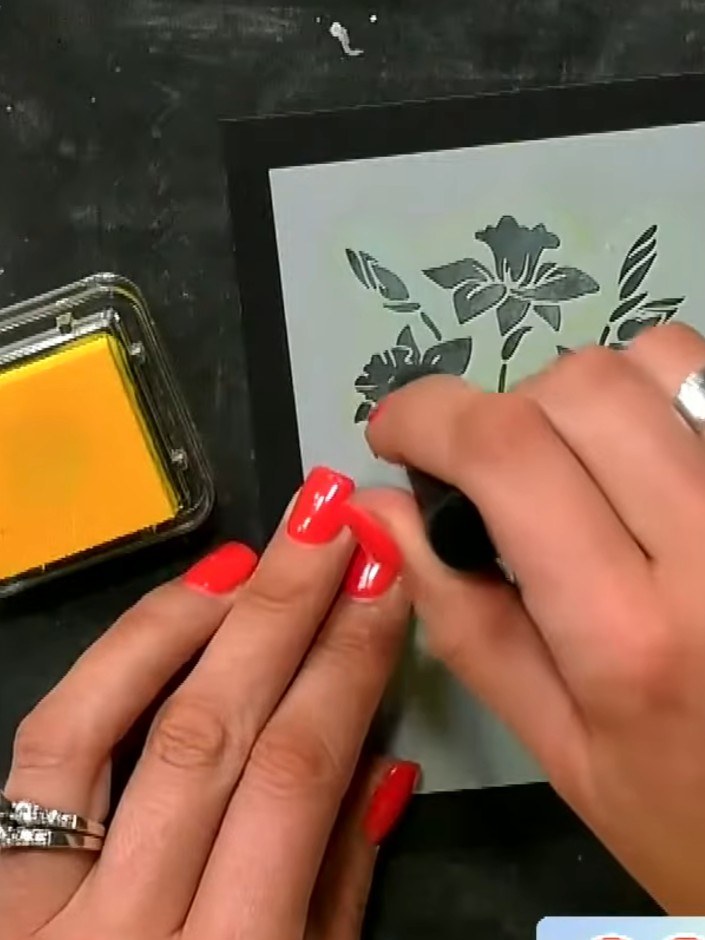 Step 3: Add green pigment ink over the stencilled design to introduce additional colour variation. Layer the green ink
