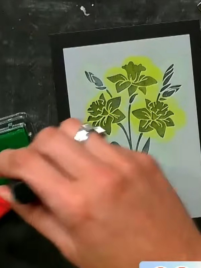 Step 5: Tap off the excess embossing powder from your stamped image back into the pot. Use gentle tapping motions to r