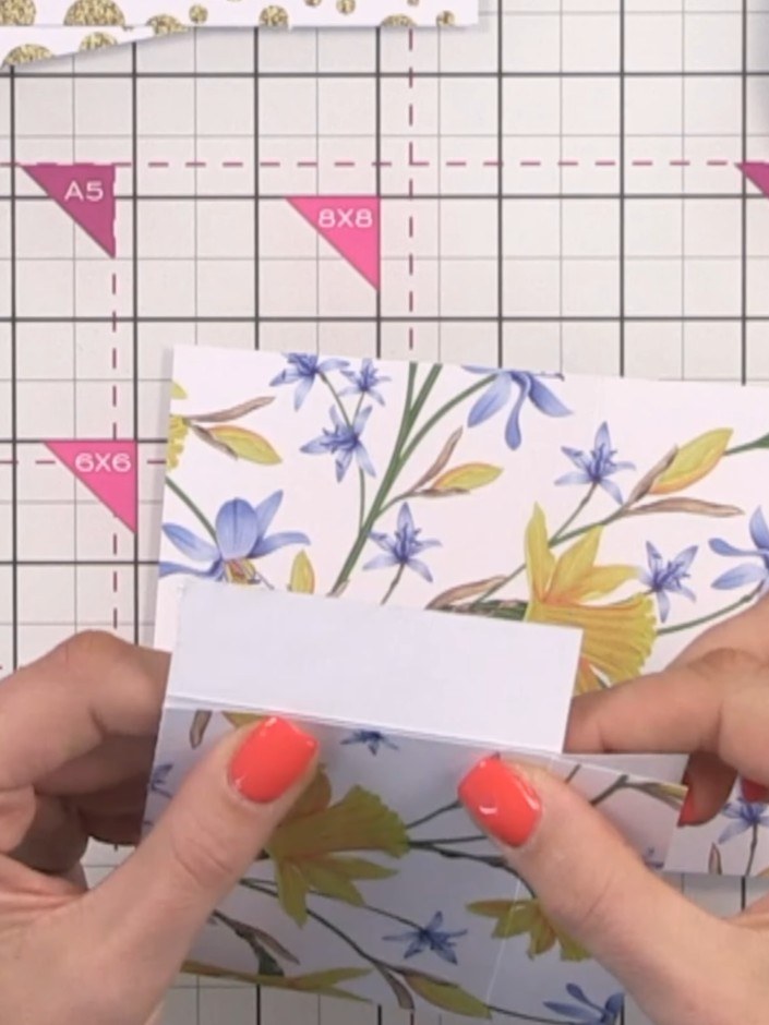 Step 11: Score all the landscape edges of each pocket piece to create fold lines. Apply glue down the sides and across 
