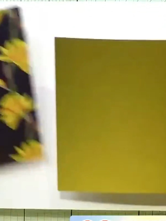 Step 5: Add a strip of patterned paper from the Oxford Blue collection across the card as a design breaker. Position i