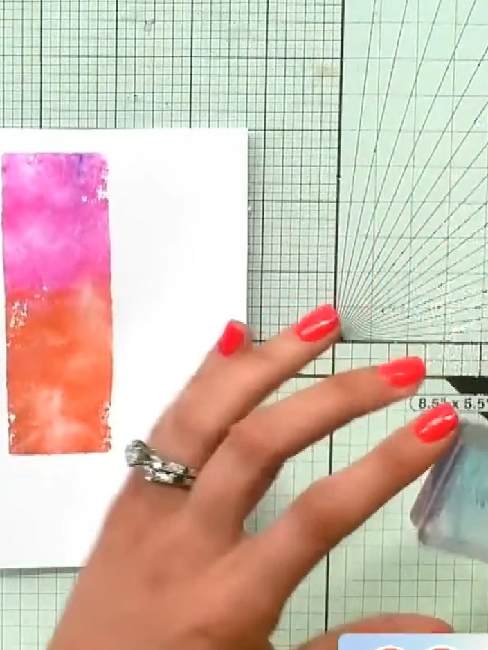 Step 2: Spray the inked block lightly with water from a spray bottle to create a puddle effect on the watercolour pane
