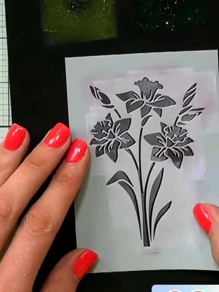 Step 5: Optional: Use a white or silver gel pen to add fine highlight lines and details to the flowers and leaves, bri