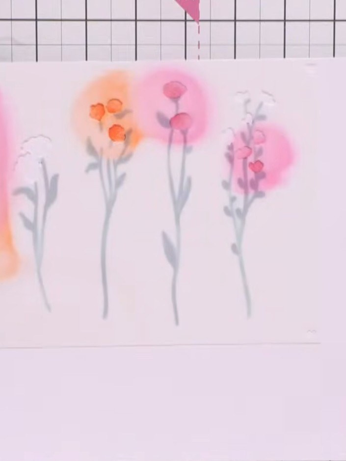 Step 4: Apply stencil number 4 using purple ink to add definition and enhance the flower heads. Dab the ink gently ove