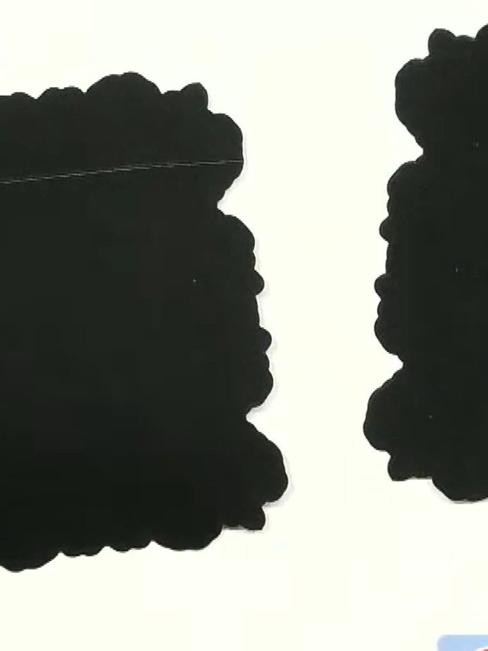 Step 2: Score one of the black scalloped card pieces horizontally across the waist area to create a fold line for the 