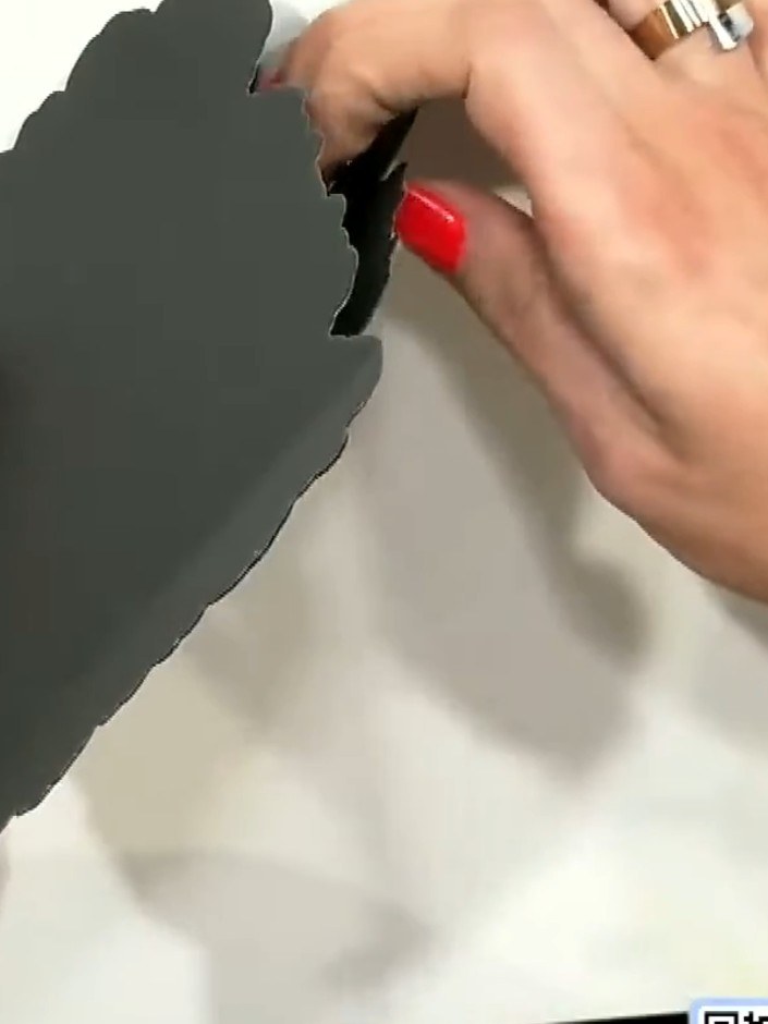 Step 4: Take the waist section that has fallen out from the middle of the die-cut dress shape. This piece will be used