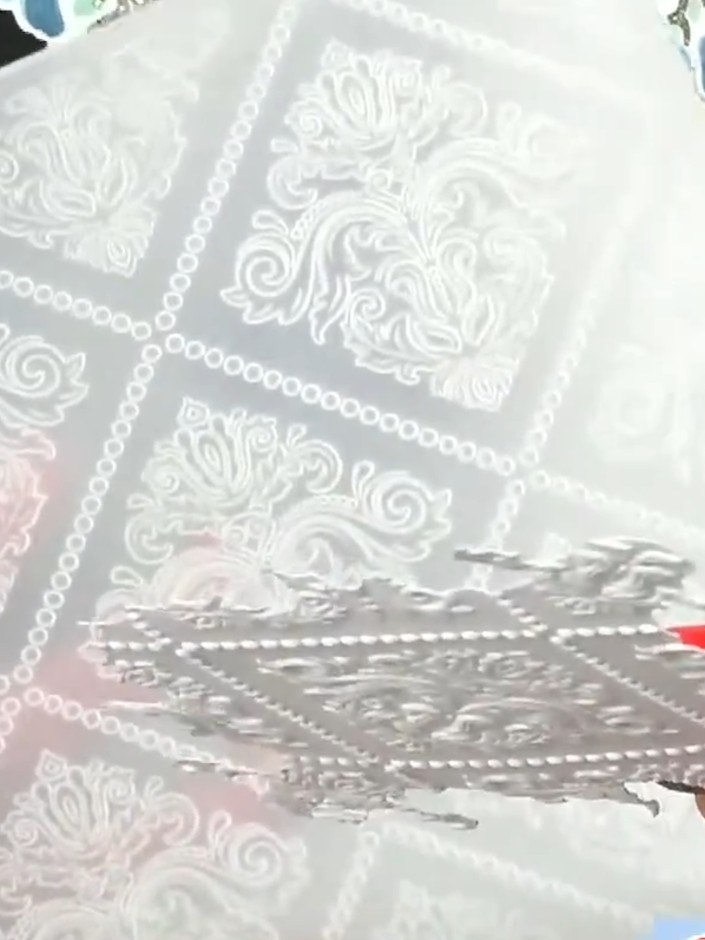 Step 6: Position the embossed waist piece back into the card aperture. You can place it flat or curve it slightly outw