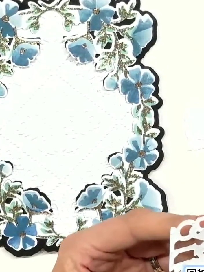 Step 1: Take your decorative floral frame card blank and arrange it in landscape orientation on your craft mat. The fr