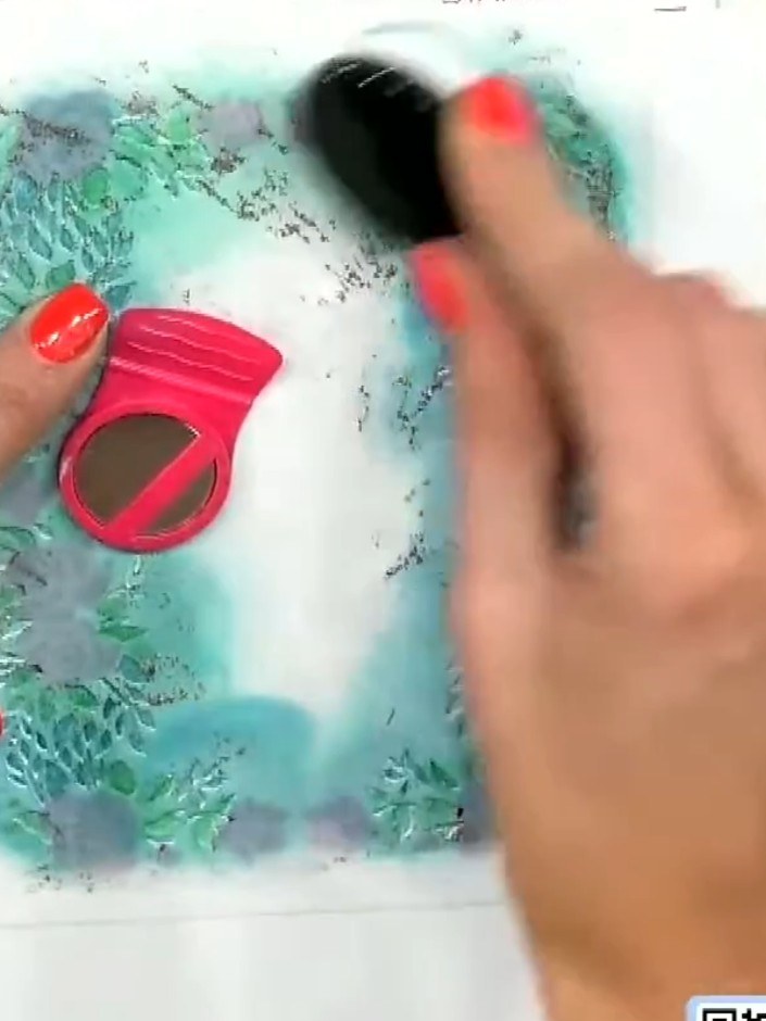 Step 2: Apply clear embossing ink over the stamped dress area using a blending brush. Work the ink thoroughly over all