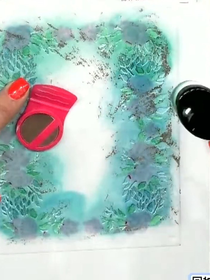 Step 3: Sprinkle clear embossing powder generously over the heat embossed dress design on your card. Ensure all the in