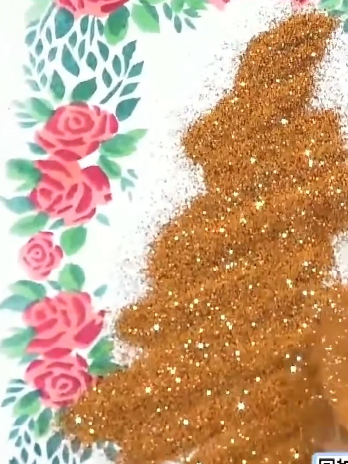 Step 5: Allow the heat embossed glitter area to cool completely before handling. The embossing powder will set as it c