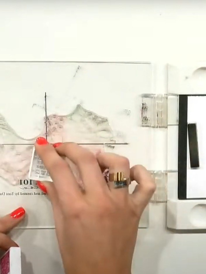 Step 3: Locate stamp number two and line up the heart registration mark with the heart on your first stamped layer. En