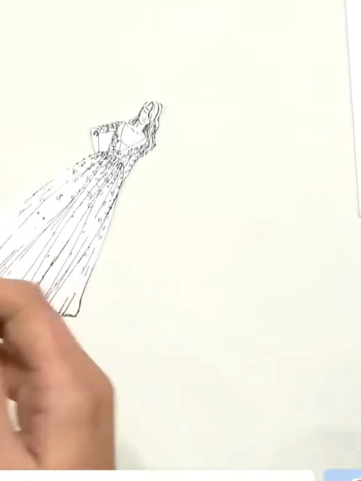 Step 2: Using scissors, carefully cut away the neck and head of the stamped lady figure, leaving the gown intact. Cut 
